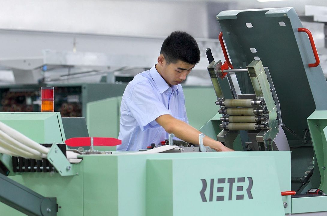 Rieter field service expert is working on the draw frame machine