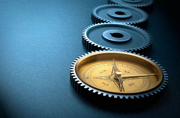 Kompass und Zahnräder