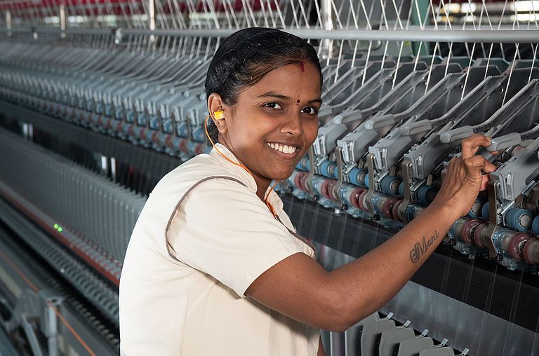 Spinning mill operator training on rotor spinning machine Spinning mill operator