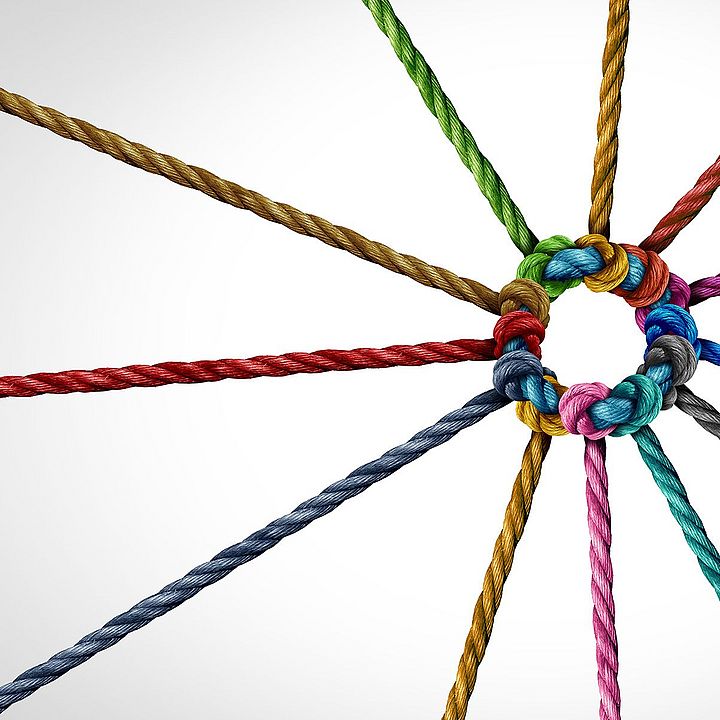 Interconnected yarn strands symbolizing the relationships between Rieter and spinning mills worldwide.