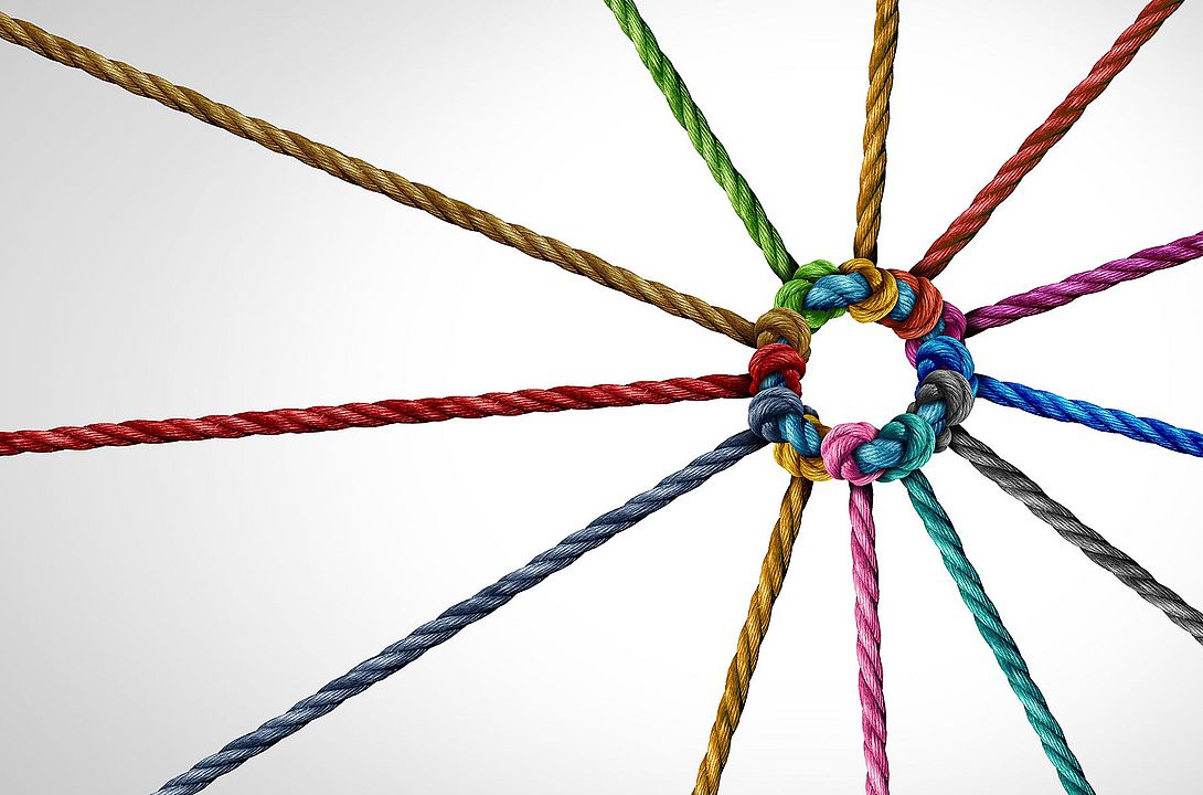 Interconnected yarn strands symbolizing the relationships between Rieter and spinning mills worldwide.