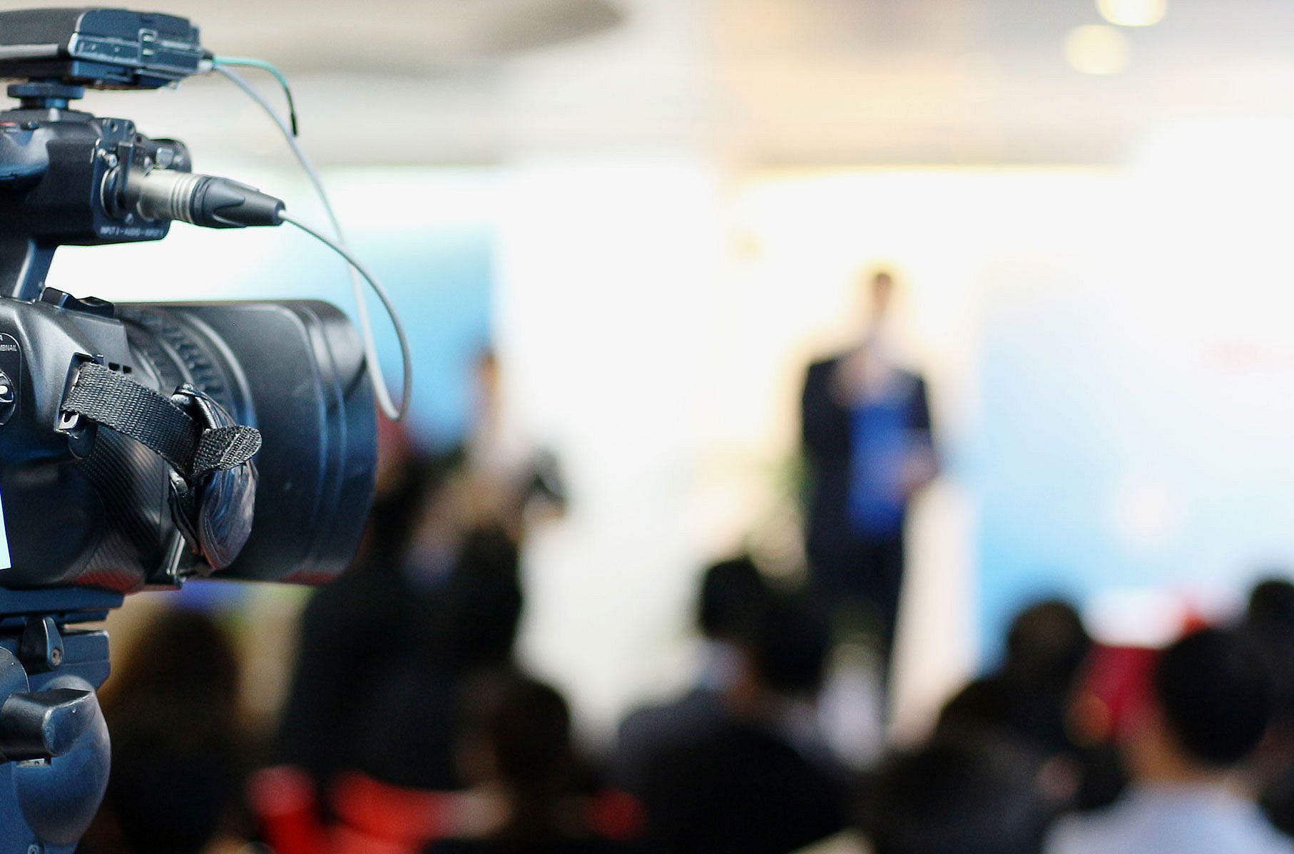 Camera at a media presentation 