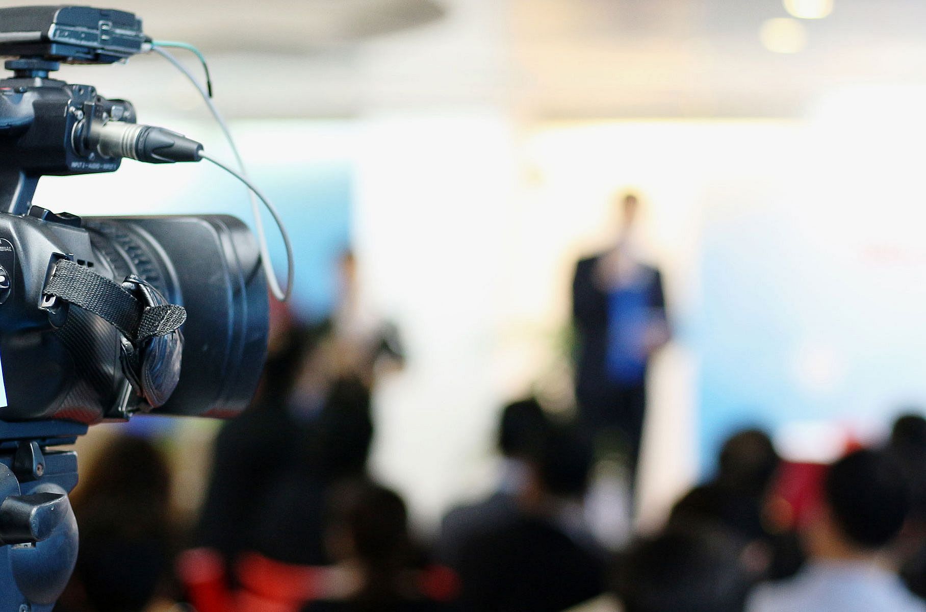 Camera at a media presentation 