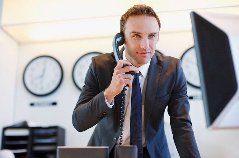 Business controller on the phone