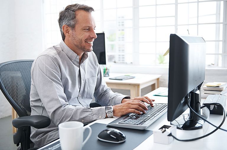 IT project manager working on the computer