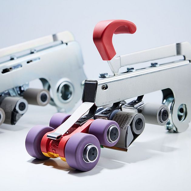 Suessen top weighting arms