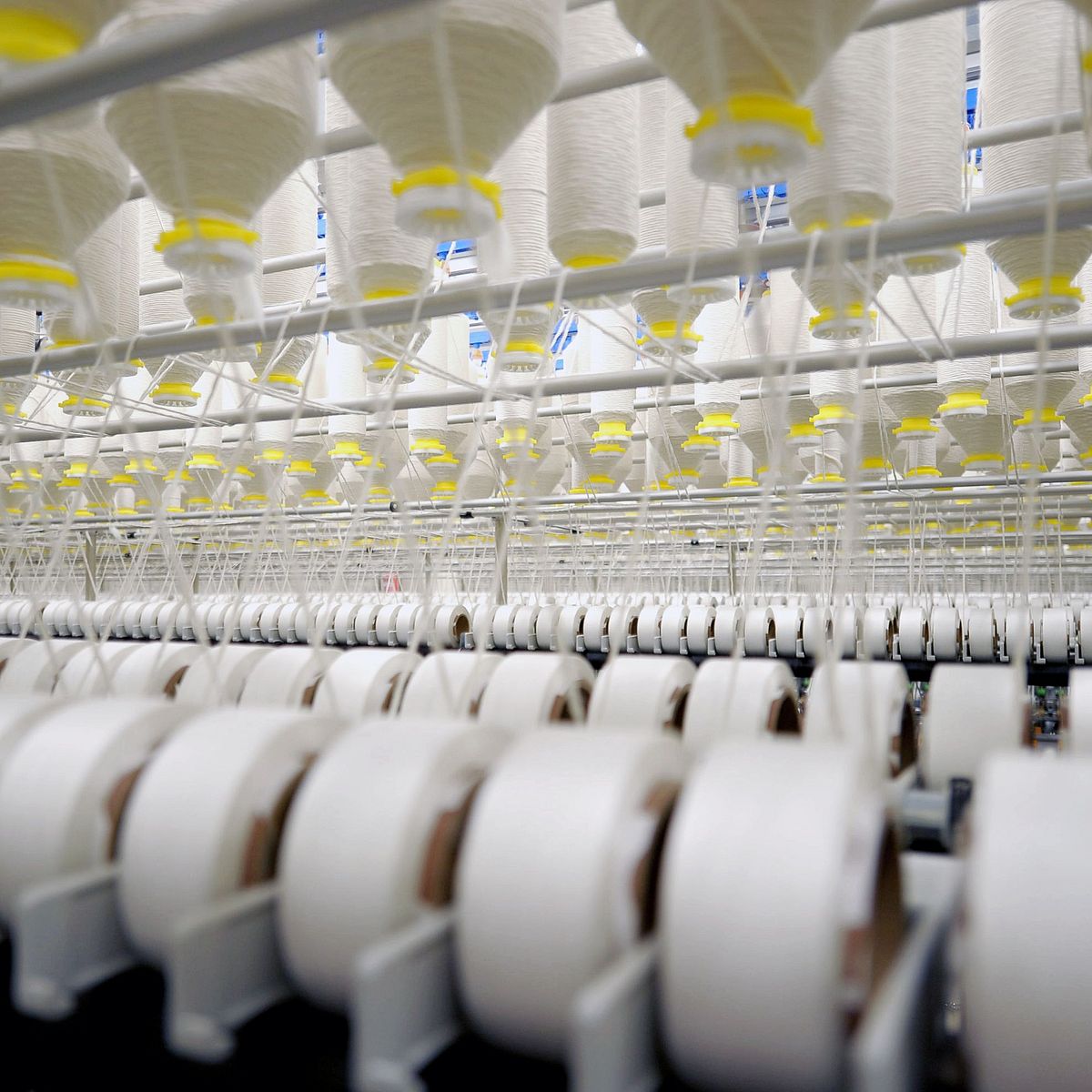 Advantageous AirCovering Process for Spinning Corespun Yarns with a