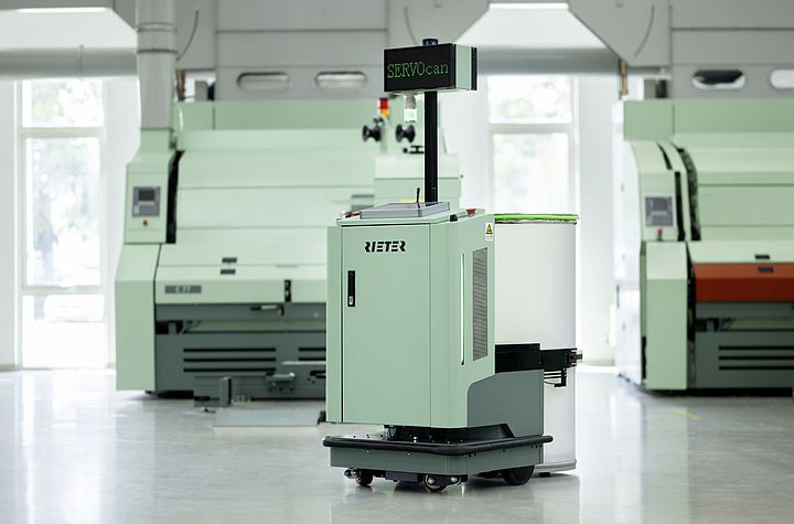 Spinning Mill robot: Rieter automation solution presented at ITMA Asia 2025.