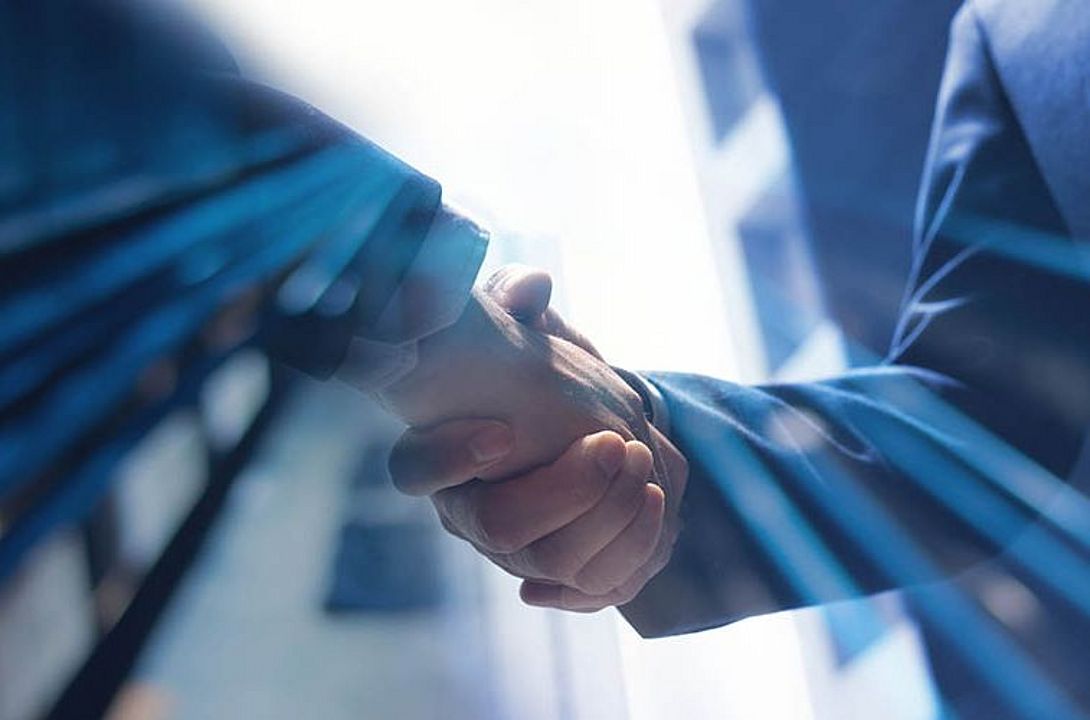 Symbol: Businessmen shaking hands